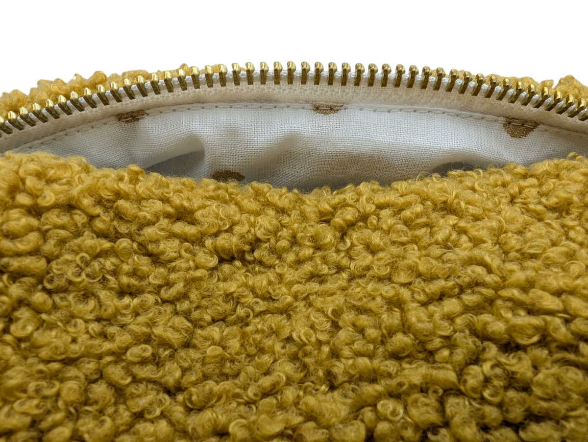Trousse fausse fourrure sherpa ocre